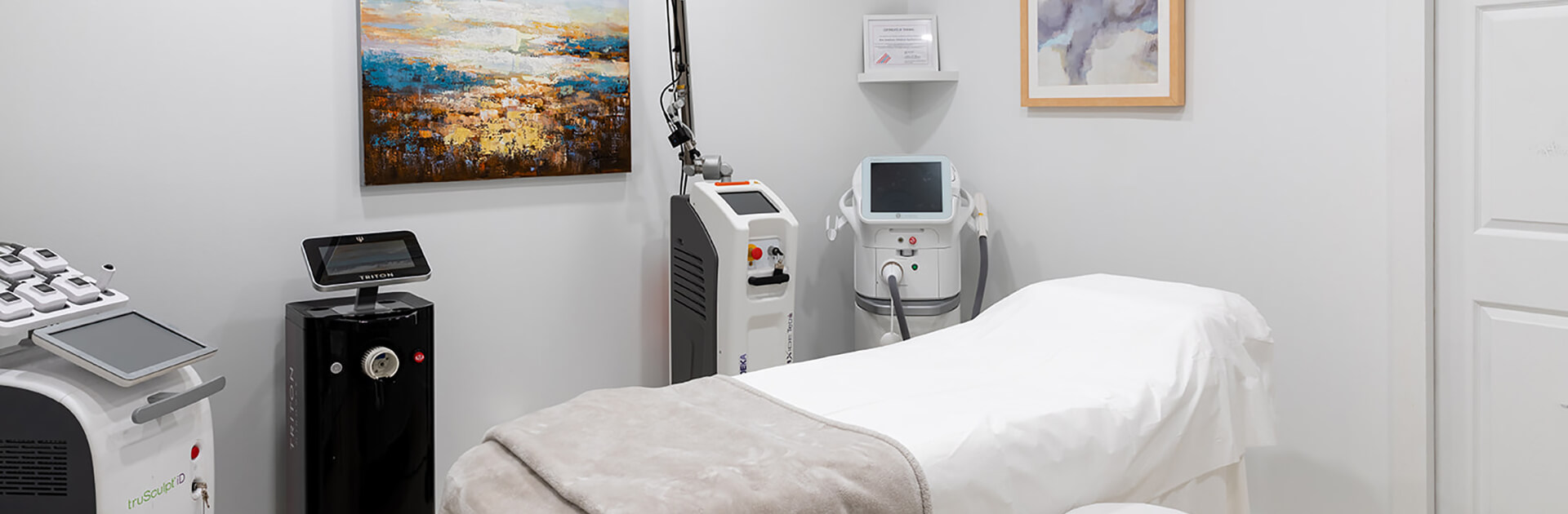 Clean, professional medical spa treatment room with neutral tones at The Retreat at Carolina Hormone and Health Center in Columbia